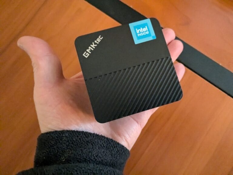 GMKTec G5 in palm of hand.